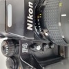 Kamera Nikon i fotoväska