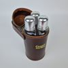 Objektivfodral och etui med glasflaskor